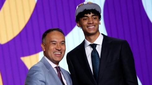 Deputy commissioner Mark Tatum and Max Christie as Los Angeles Lakers player