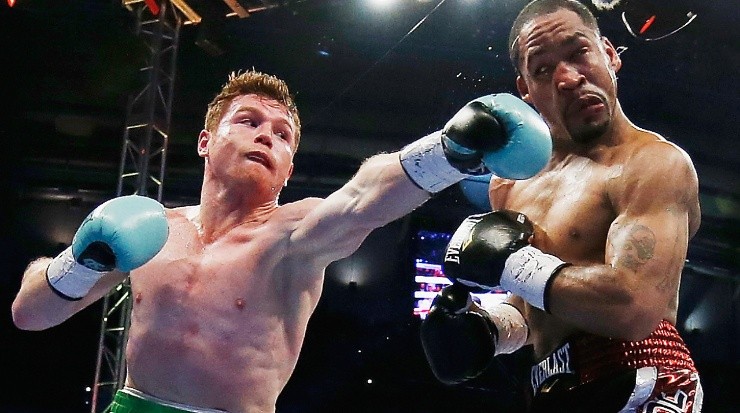 Canelo Alvarez punching James Kirkland. (Scott Halleran/Getty Images)