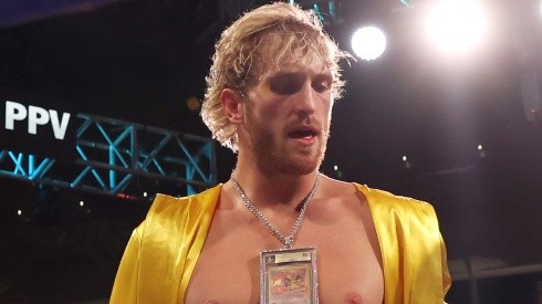 Logan Paul wears a Charizard Pokemon card chain as he enters the ring for his contracted exhibition boxing match against Floyd Mayweather at Hard Rock Stadium on June 06, 2021 in Miami Gardens, Florida.