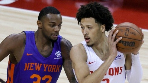 Cade Cunningham of the Detroit Pistons and Aamir Simms of the New York Knicks during the 2021 NBA Summer League
