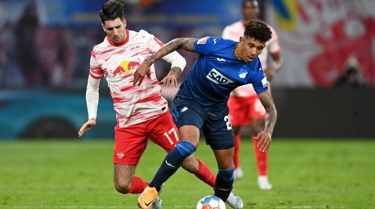 Chris Richards of TSG 1899 Hoffenheim is challenged by Dominik Szoboszlai of RB Leipzig during the Bundesliga match between RB Leipzig and TSG Hoffenheim at Red Bull Arena on April 10, 2022 in Leipzig, Germany. (Photo by Stuart Franklin/Getty Images)