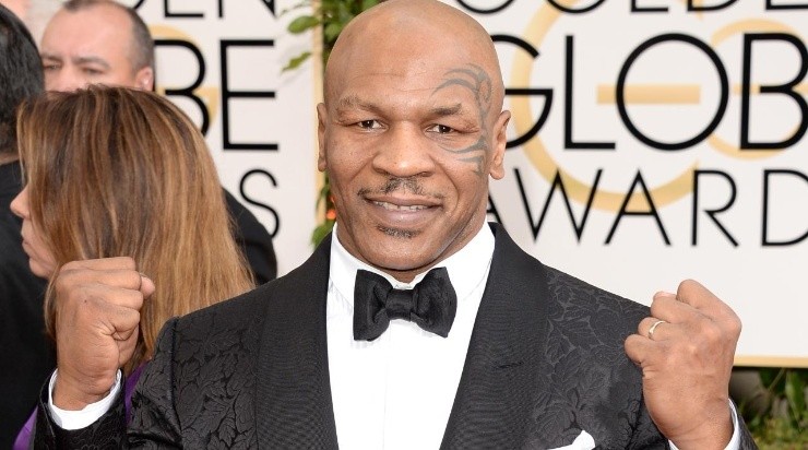 Former boxer Mike Tyson attends the 71st Annual Golden Globe Awards held at The Beverly Hilton Hotel on January 12, 2014 in Beverly Hills, California. (Photo by Jason Merritt/Getty Images)