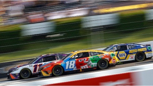 Denny Hamlin, Kyle Busch, and Chase Elliott fight for the first place in Pocono