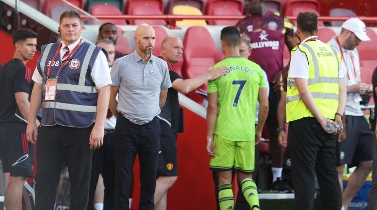 Erik ten Hag manager of Manchester United looks on as Cristiano Ronaldo walks past him following the Premier League match between Brentford FC and Manchester United (Photo by Catherine Ivill/Getty Images)