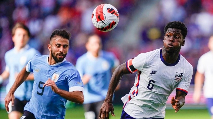 Yunus Musah #6 of the United States collects a long pass as Diego Rossi #9 of Uruguay (Photo by Kyle Rivas/Getty Images)