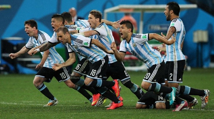 Argentina celebrate defeating the Netherlands in a penalty shootout during the 2014 FIFA World Cup Brazil Semi Final match between the Netherlands and Argentina (Photo by Dean Mouhtaropoulos/Getty Images)