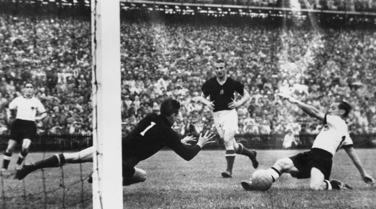 Morlock, West Germany&#039;s inside-right, scores against Hungary in the World Cup Final at Berne, Switzerland. Germany went on to become World Champions with a 3-2 victory. (Photo by Keystone/Getty Images)