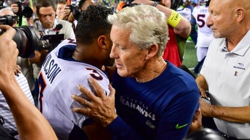 Broncos quarterback Russell Wilson (left) and Seahawks head coach Pete Carroll.