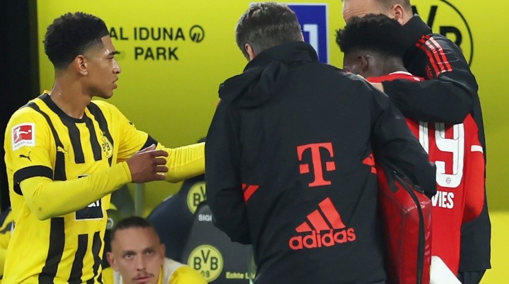 Jude Bellingham of Borussia Dortmund and Alphonso Davies of Bayern. (Alex Grimm/Getty Images)