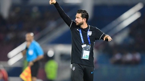 Assistant head Coach Benjamin Mora of Malaysia s Johor Darul Ta zim F C shouts instructions to his