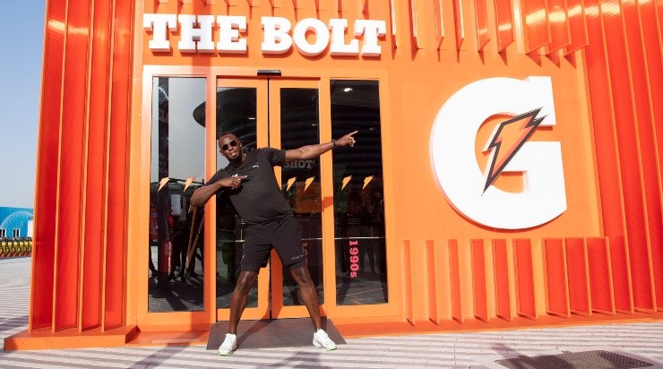 Bolt y su típica imagen posando en un evento de una de sus marcas patrocinantes (Getty)