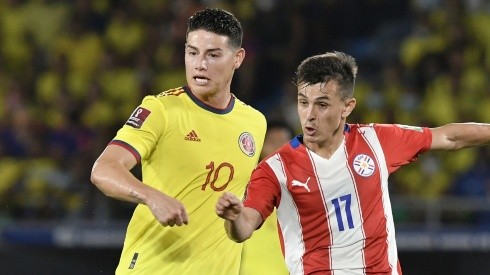 Andres Cubas of Paraguay and James Rodriguez of Colombia