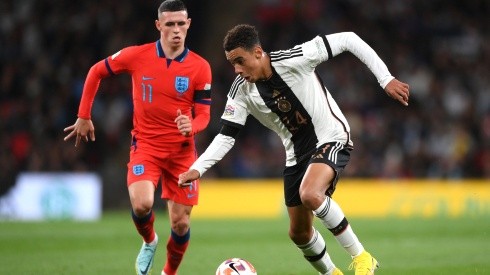 Jamal Musiala of Germany and Phil Foden of England