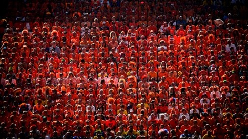 A tide of people dressed in the same color, accompanying the World Cup passion.