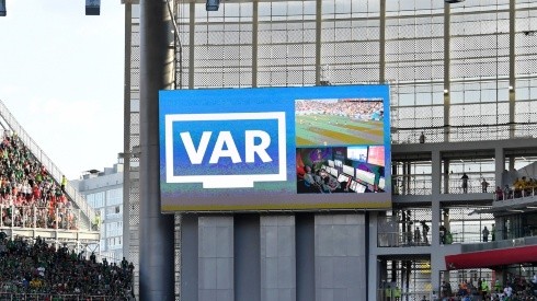 A VAR review displayed on a big screen.