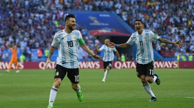 Lionel Messi and Angel Di Maria of Argentina celebrate during the 2018 FIFA World Cup (Photo by Shaun Botterill/Getty Images)