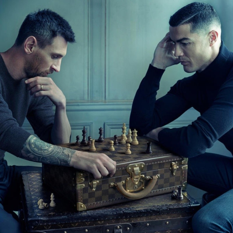 Cristiano Ronaldo and Lionel Messi Taking Photo playing chess in