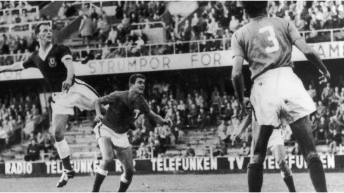 Welsh centre-forward John Charles (left) makes an attack on the Mexican goal during the Wales-Mexico World Cup match in Stockholm