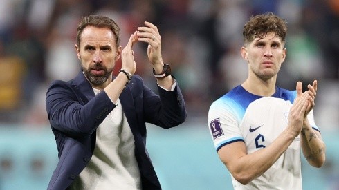 Gareth Southgate and John Stones of England applauds the fans after their sides victory during the FIFA World Cup Qatar 2022 Group B match between England and IR Iran at Khalifa International Stadium on November 21, 2022 in Doha, Qatar.