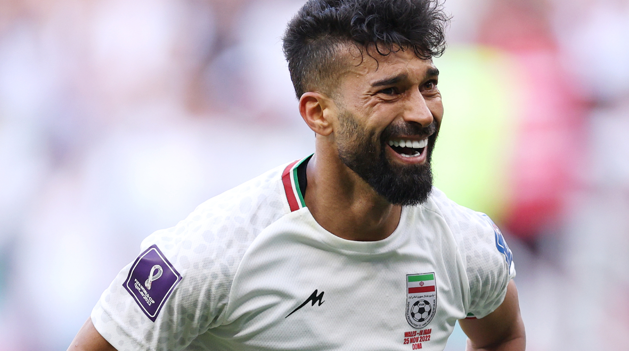 Ramin Rezaeian of IR Iran celebrates after scoring their team's second goal during the FIFA World Cup Qatar 2022 Group B match.