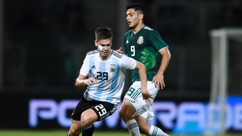 Juan Foyth of Argentina against Raul Jimenez of Mexico in an international friendly in 2018.