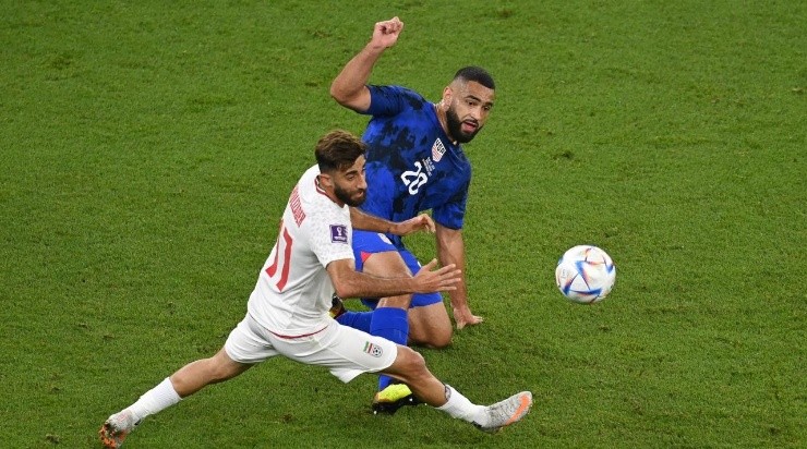 Cameron Carter-Vickers of United States battles for possession with Ali Gholizadeh of IR Iran during the FIFA World Cup Qatar 2022 Group B match between IR Iran and USA at Al Thumama Stadium on November 29, 2022 in Doha, Qatar. (Photo by Claudio Villa/Getty Images)