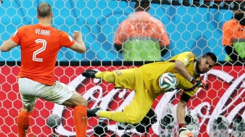 Sergio Romero of Argentina saves the penalty kick of Ron Vlaar of the Netherlands at the 2014 FIFA World Cup