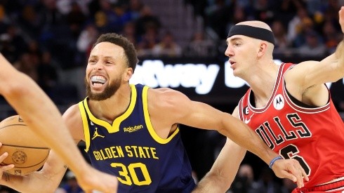 Stephen Curry y Alex Caruso.