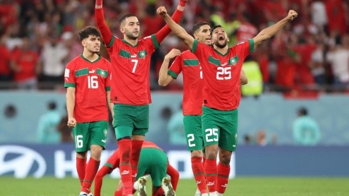 Hakim Ziyech and Yahya Attiat-Allah of Morocco celebrate during the penalty shootout in the FIFA World Cup Qatar 2022 Round of 16 match between Morocco and Spain at Education City Stadium on December 06, 2022 in Al Rayyan, Qatar.