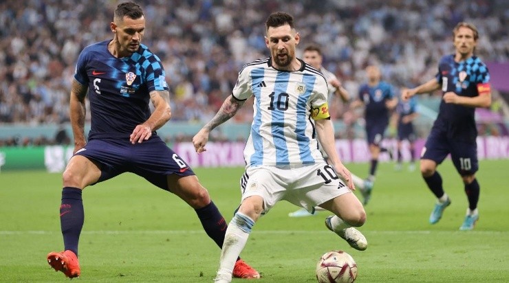 Lionel Messi of Argentina in action with Dejan Lovren of Croatia during the FIFA World Cup Qatar 2022 semi final match between Argentina and Croatia. (Photo by Clive Brunskill/Getty Images)