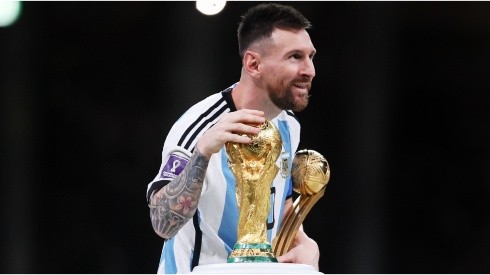 Lionel Messi of Argentina touches the FIFA World Cup Winners