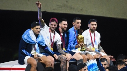 Leandro Paredes, Rodrigo De Paul, Lionel Messi, Angel Di Maria and Nicolas Otamendi celebrate on the bus during the arrival of the Argentina men's national football team after winning the FIFA World Cup Qatar 2022 on December 20, 2022 in Buenos Aires, Argentina.