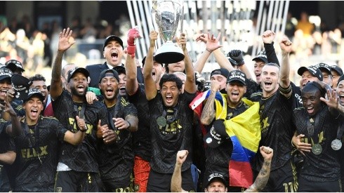 Carlos Vela of Los Angeles FC lifts the championship trophy