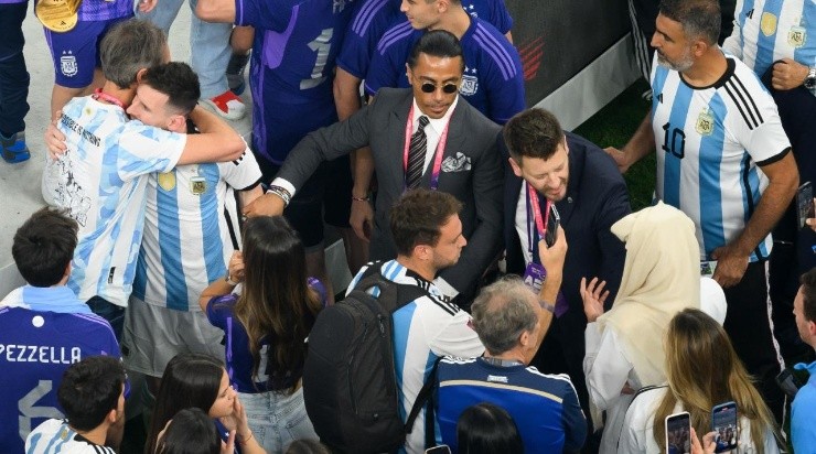 Nusret Goekce, nicknamed Salt Bae, tries to take a selfie-photo with Lionel Messi of Argentina after the FIFA World Cup Qatar 2022 Final match between Argentina and France (Photo by Matthias Hangst/Getty Images)