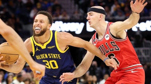 Stephen Curry y Alex Caruso.