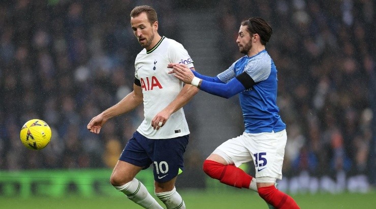 : Harry Kane of Tottenham Hotspurs holds off Owen Dale of Portsmouth (Photo by Julian Finney/Getty Images)