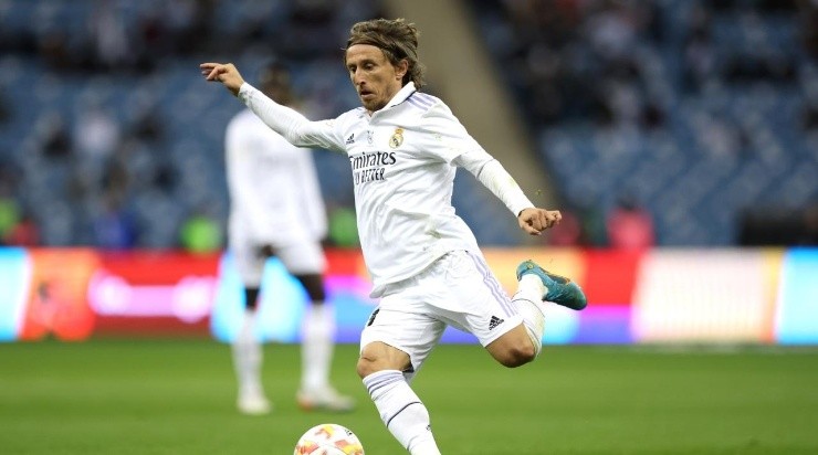 Luka Modric of Real Madrid runs with the ball during the Super Copa de Espana match between Real Madrid and Valencia CF at King Fahd International Stadium on January 11, 2023 in Riyadh, Saudi Arabia. (Photo by Yasser Bakhsh/Getty Images)