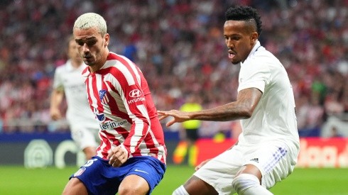 Antoine Griezmann of Atletico Madrid and Eder Militao of Real Madrid