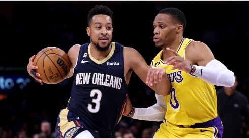 CJ McCollum #3 of the New Orleans Pelicans drives to the basket as he is guarded by Russell Westbrook #0 of the Los Angeles Lakers