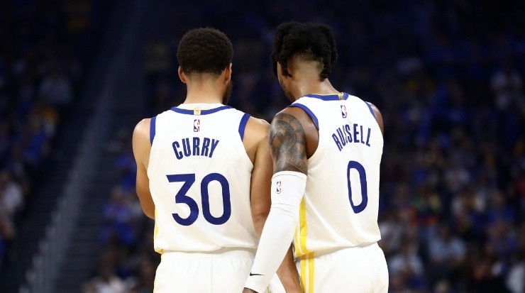 D&#039;Angelo Russell y Stephen Curry. (Ezra Shaw/Getty Images)
