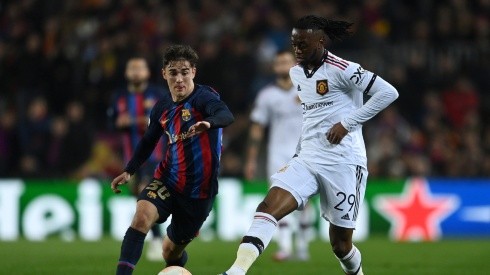Gavi of FC Barcelona battles for possession with Aaron Wan-Bissaka of Manchester United