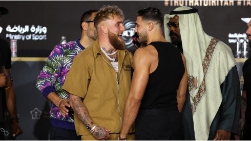 Jake Paul and Tommy Fury (R) clash during the Press Conference