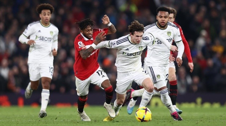 Brenden Aaronson of Leeds United runs with the ball whilst under pressure from Fred of Manchester United during the Premier League match between Manchester United and Leeds United at Old Trafford on February 08, 2023 in Manchester, England. (Photo by Naomi Baker/Getty Images)