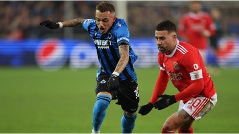 Noa Lang of Club Brugge is tackled by Nicolas Otamendi of Benfica