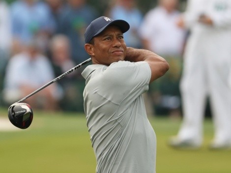 Why did Tiger Woods withdraw from the 2023 Masters Tournament?