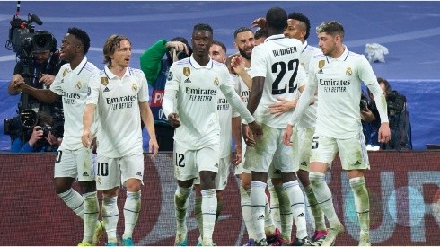 Karim Benzema of Real Madrid celebrates with teammates