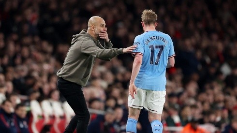 Josep Guardiola y Kevin de Bruyne.