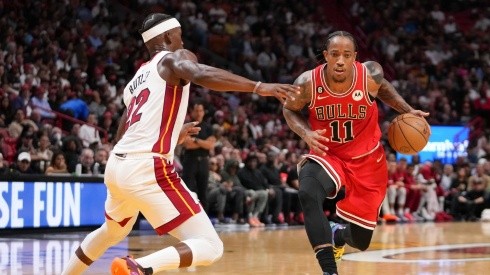 DeMar DeRozan #11 of the Chicago Bulls drives against Jimmy Butler #22 of the Miami Heat.