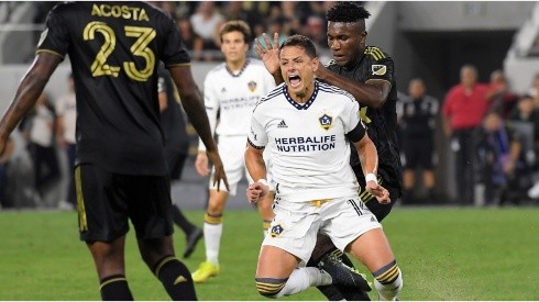 Javier Hernandez #14 of Los Angeles Galaxy is fouled by Jose Cifuentes #20 of Los Angeles FC