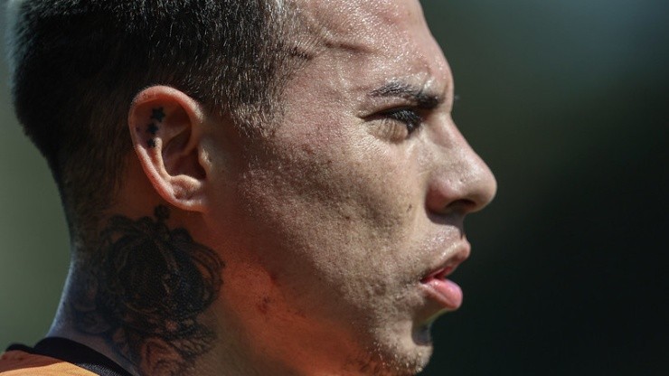 PSG's Gregory van der Wiel sports a tattoo in his neck as he